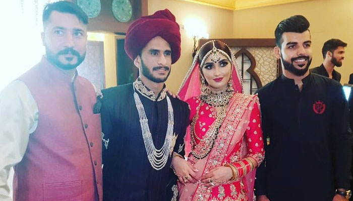 The newly weds with cricketer Shadab Khan and a guest. Photo: Social media