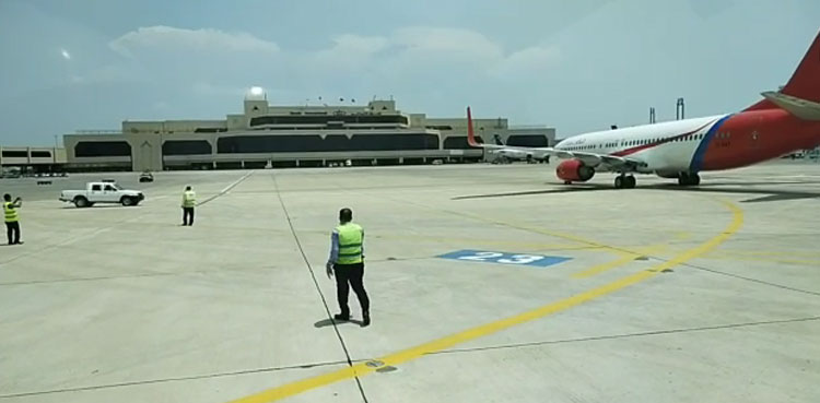 fly baghdad first flight pakistan water cannon salute karachi airport